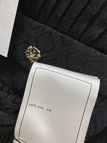 Chanel Black Ribbed Knit Jacket with Classic Collar & Button Details – Timeless Elegance