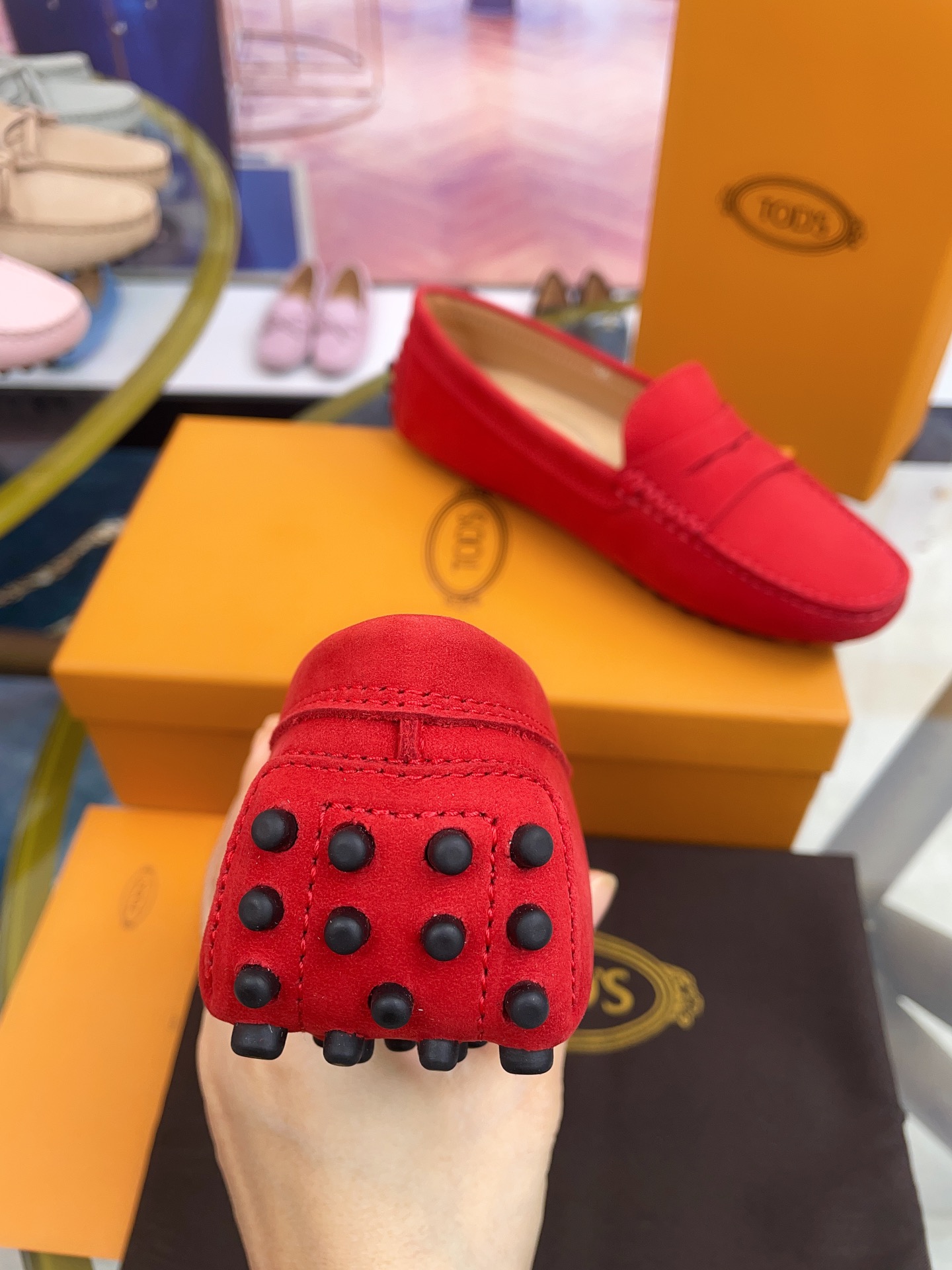 Tod’s Classic Women’s Gommino Driving Loafers – Red Suede with Rubber Pebble Sole (Sizes 35–41)