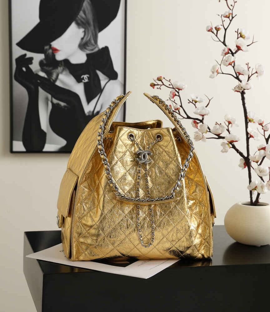 Chanel 25C Early Spring Collection – Gold Metallic Quilted Bucket Bag with Chain Strap & Adjustable Drawstring Closure (Model AS5311)