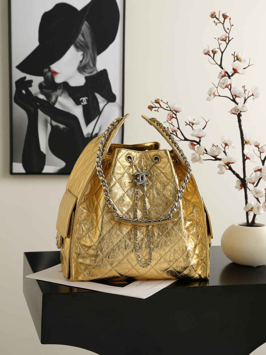 Chanel 25C Early Spring Collection – Gold Metallic Quilted Bucket Bag with Chain Strap & Adjustable Drawstring Closure (Model AS5311)