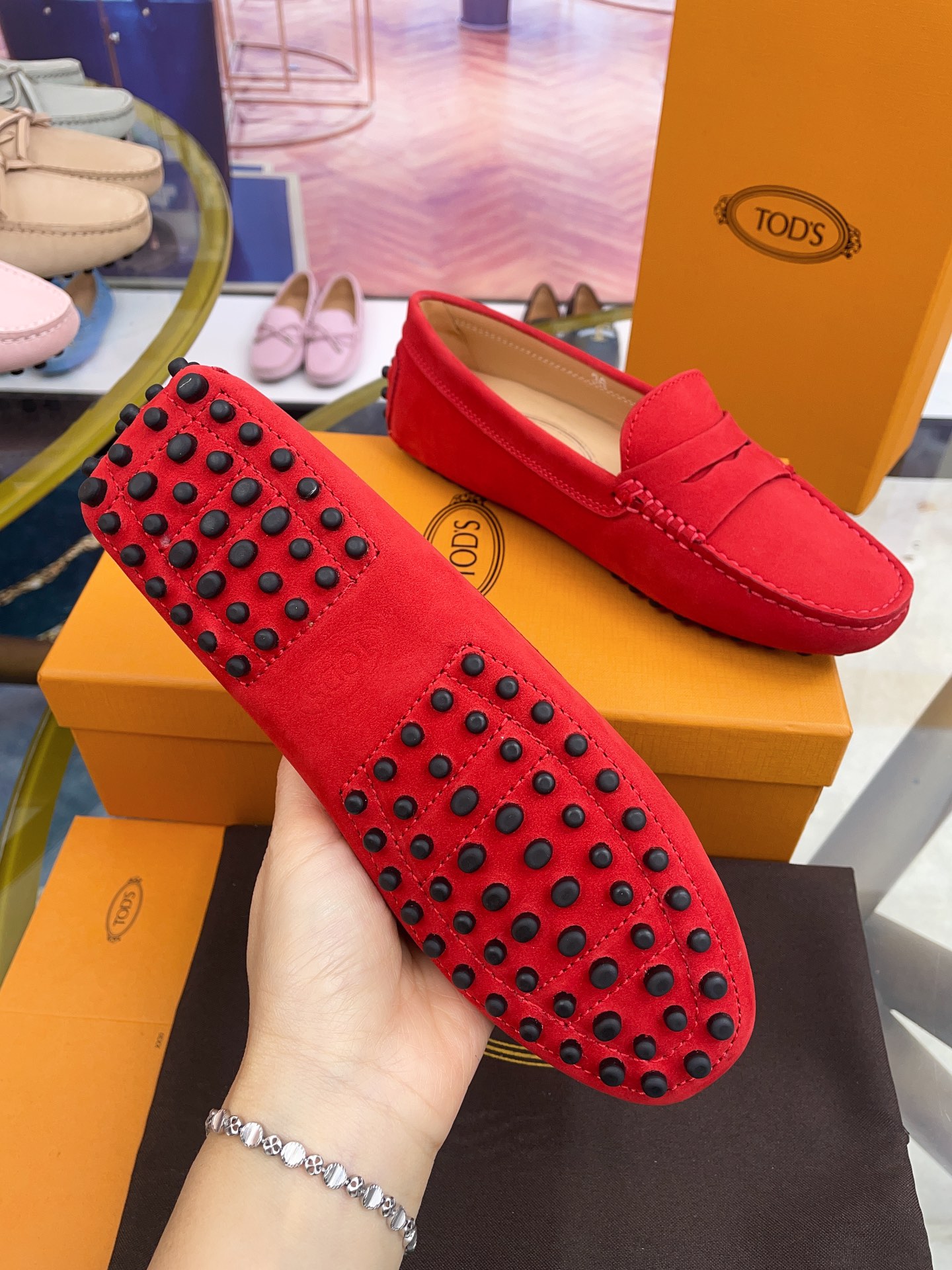 Tod’s Classic Women’s Gommino Driving Loafers – Red Suede with Rubber Pebble Sole (Sizes 35–41)