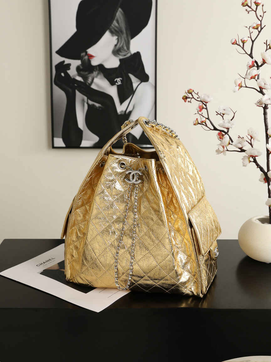 Chanel 25C Early Spring Collection – Gold Metallic Quilted Bucket Bag with Chain Strap & Adjustable Drawstring Closure (Model AS5311)