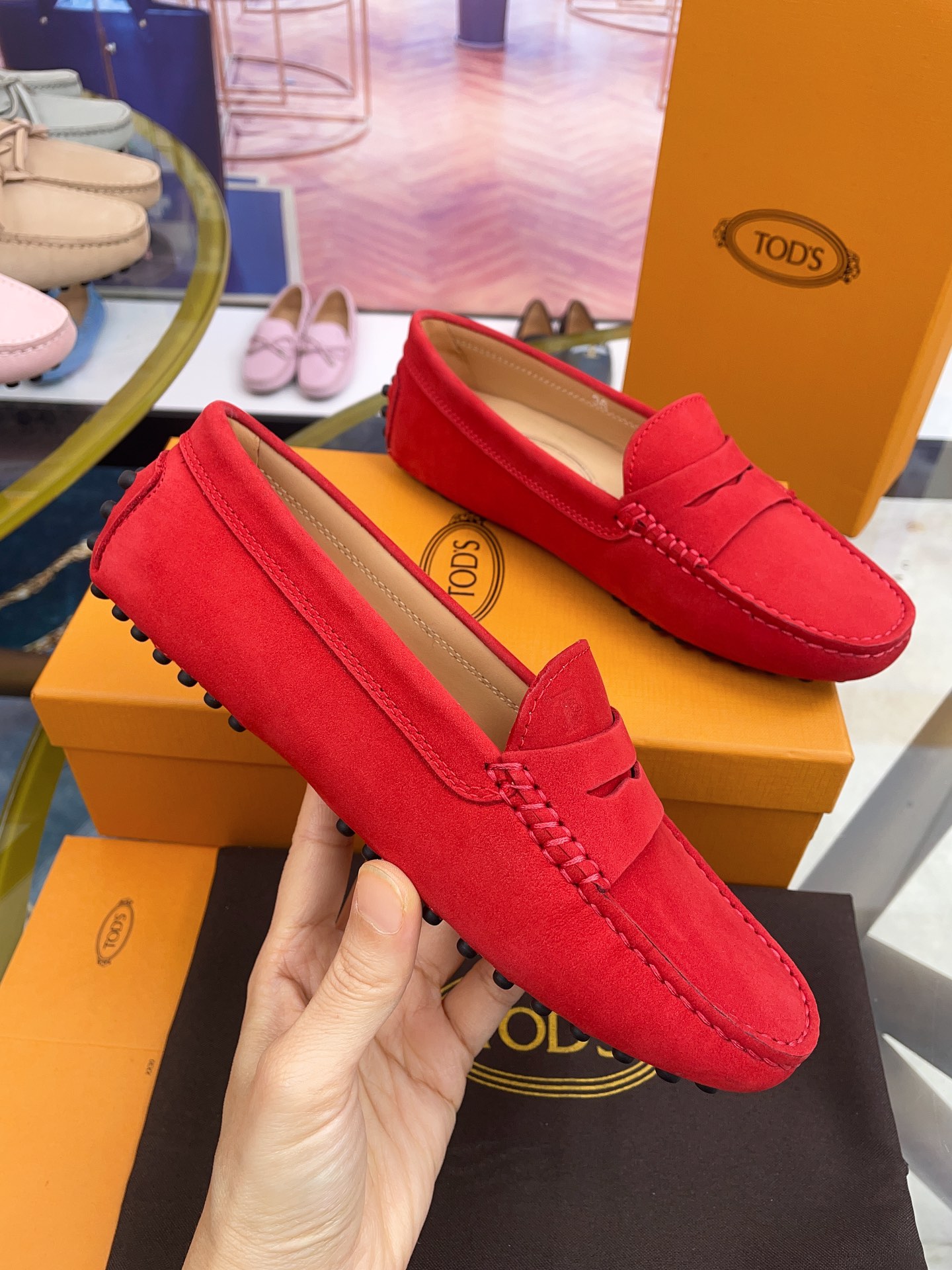 Tod’s Classic Women’s Gommino Driving Loafers – Red Suede with Rubber Pebble Sole (Sizes 35–41)