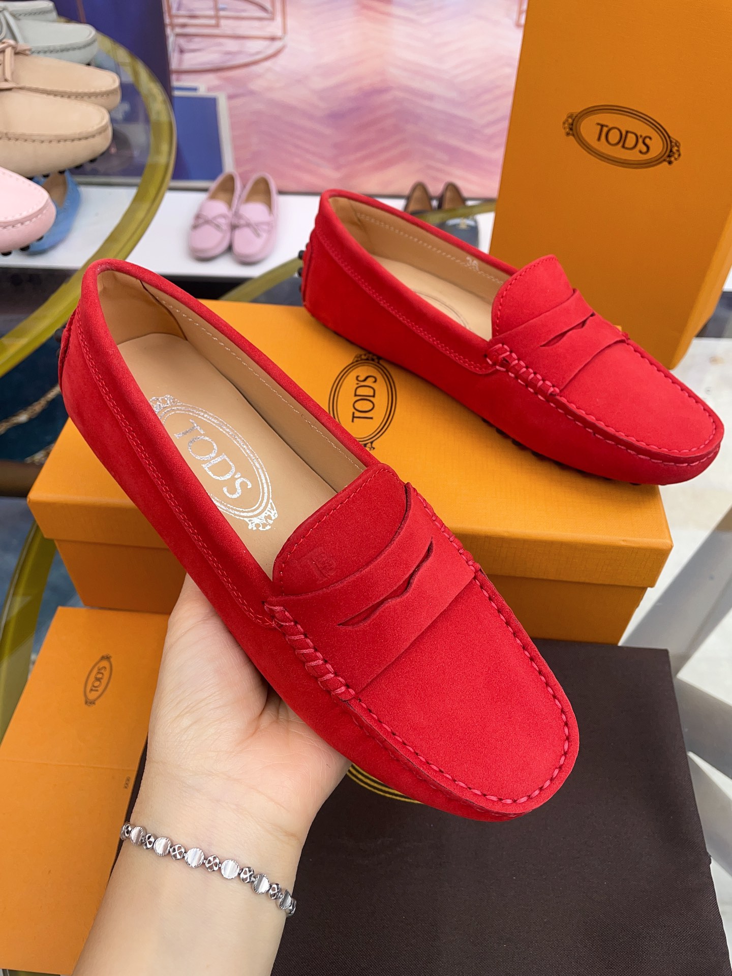 Tod’s Classic Women’s Gommino Driving Loafers – Red Suede with Rubber Pebble Sole (Sizes 35–41)
