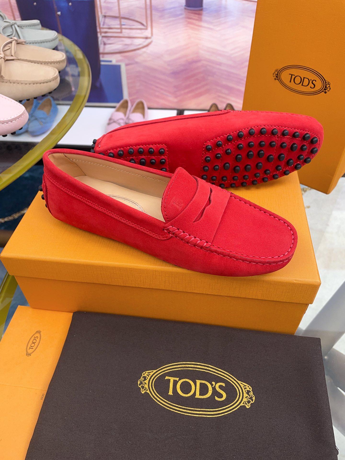 Tod’s Classic Women’s Gommino Driving Loafers – Red Suede with Rubber Pebble Sole (Sizes 35–41)