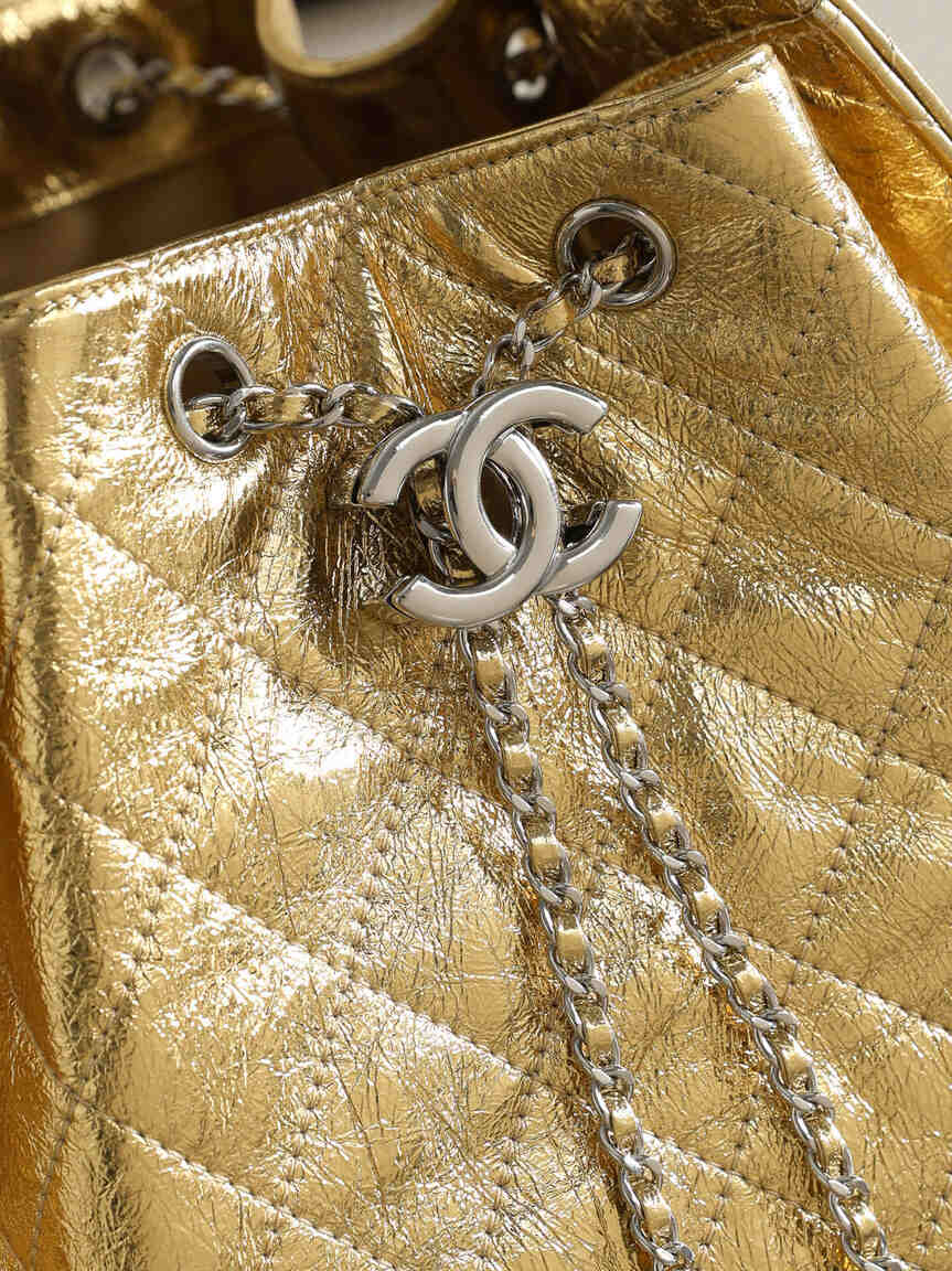 Chanel 25C Early Spring Collection – Gold Metallic Quilted Bucket Bag with Chain Strap & Adjustable Drawstring Closure (Model AS5311)