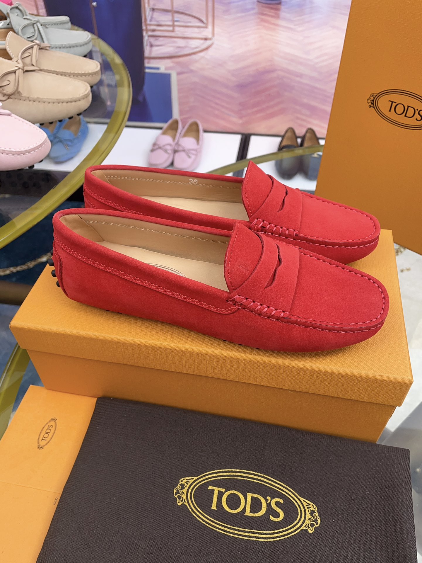 Tod’s Classic Women’s Gommino Driving Loafers – Red Suede with Rubber Pebble Sole (Sizes 35–41)