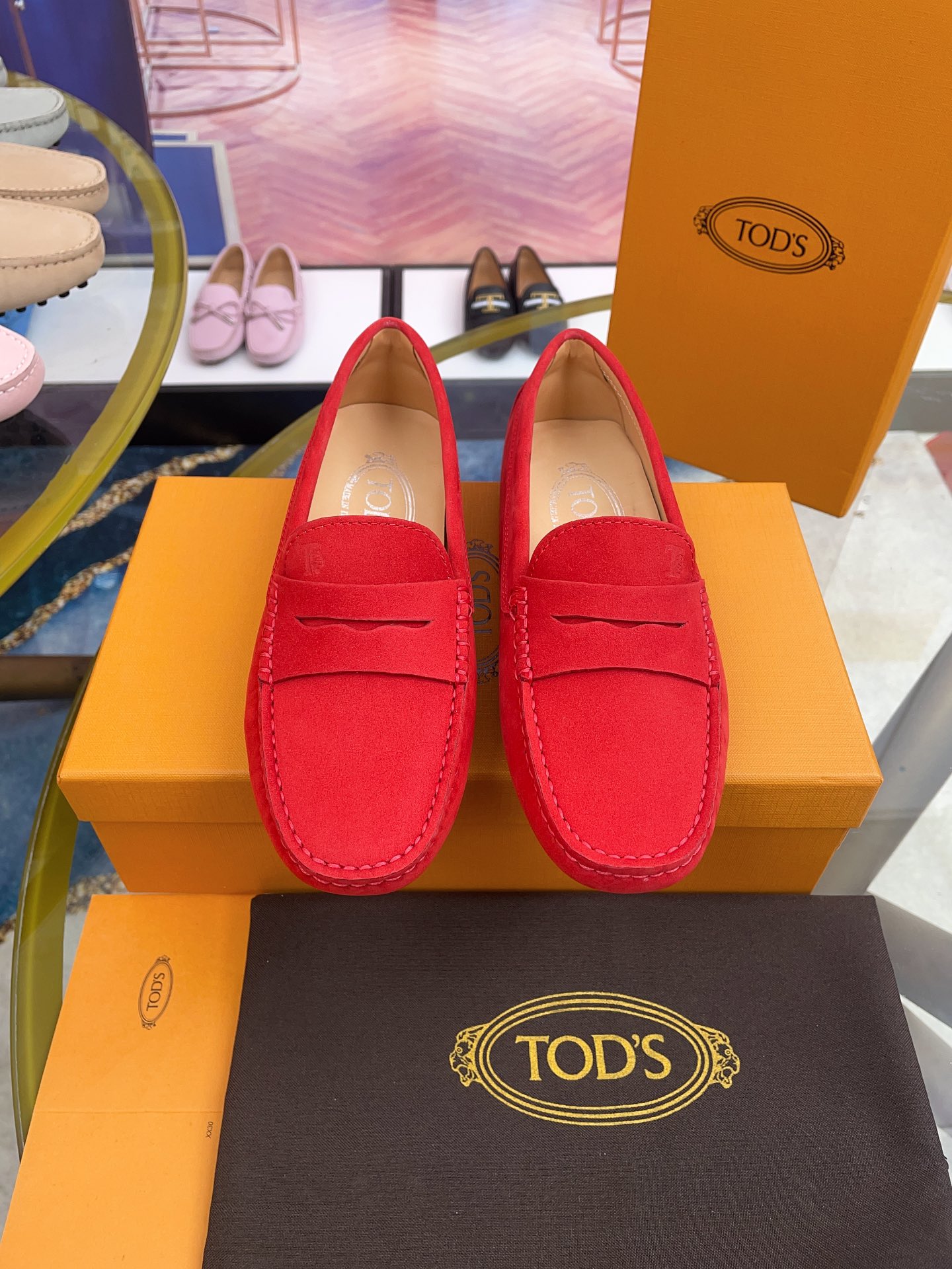 Tod’s Classic Women’s Gommino Driving Loafers – Red Suede with Rubber Pebble Sole (Sizes 35–41)