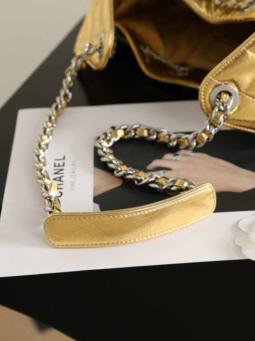 Chanel 25C Early Spring Collection – Gold Metallic Quilted Bucket Bag with Chain Strap & Adjustable Drawstring Closure (Model AS5311)