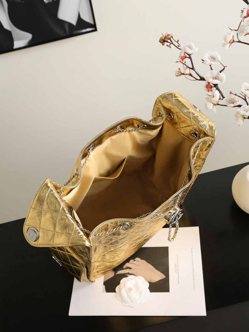 Chanel 25C Early Spring Collection – Gold Metallic Quilted Bucket Bag with Chain Strap & Adjustable Drawstring Closure (Model AS5311)